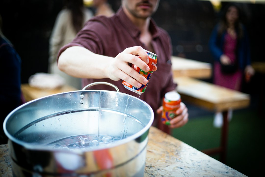 galvanized metal drink tubs with ice and bottled drinks